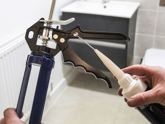 CAULK GUN CLEARING