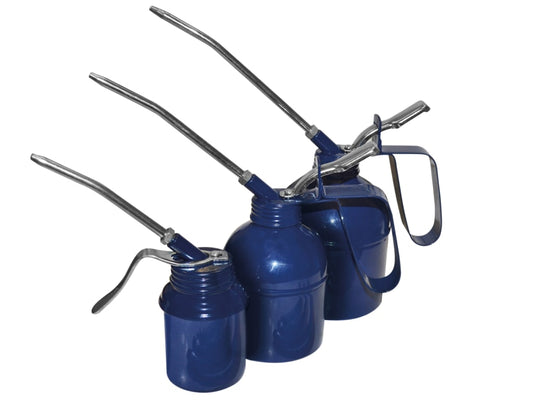 Three blue oil cans with metal nozzles on a white background