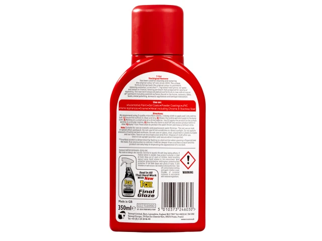 Red bottle with a label on a white background