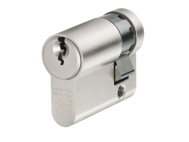 Metallic lock cylinder on a white background