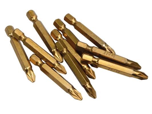 Set of gold-colored drill bits on a white background