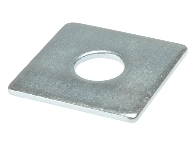 Metal washer with a central hole on a white background