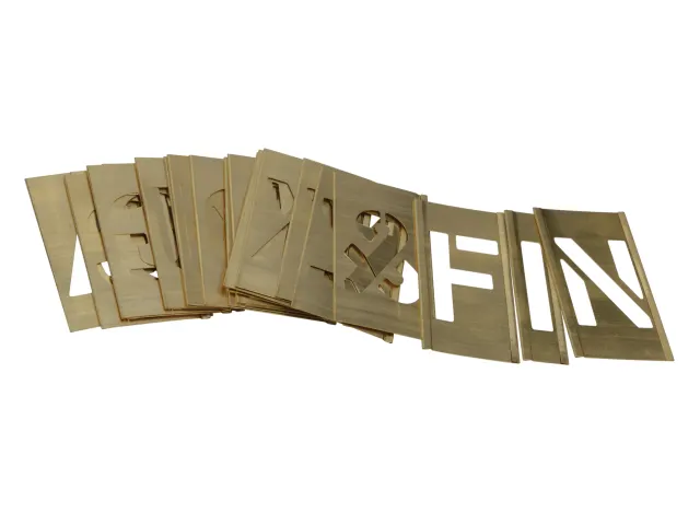 Gold metal letters spelling 'LEAF & FIN' on a white background