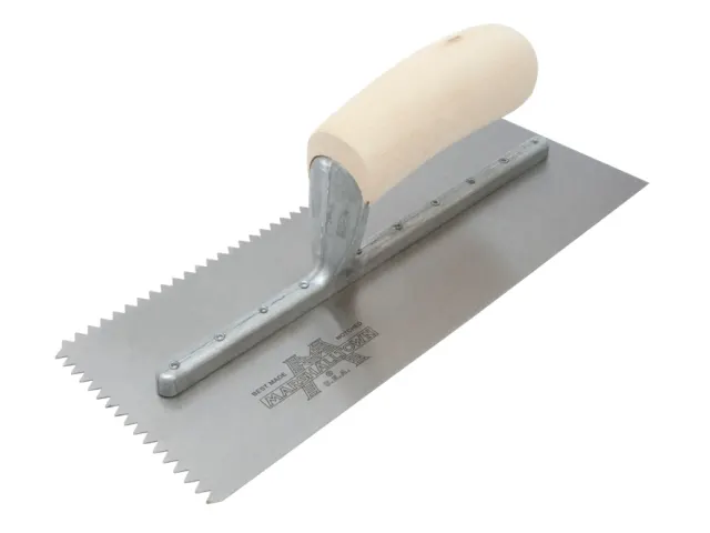 Notched trowel with wooden handle on a white background