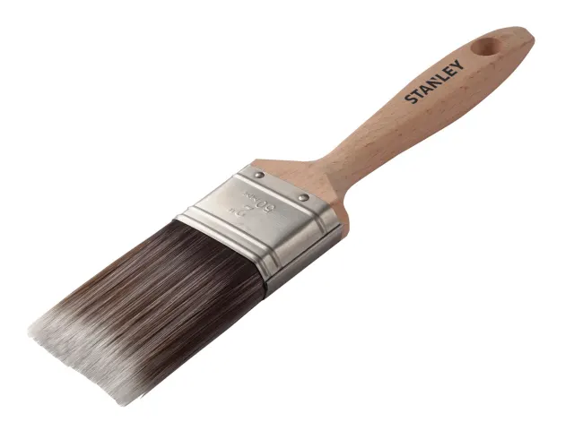 Stanley paint brush with wooden handle on a white background