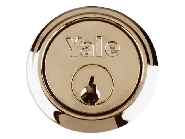 Gold Yale lock on a white background