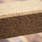 Close-up of a concrete block with a textured surface