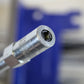 Close-up of a metal tool with a blurred background