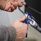 Person using a caulking gun to apply sealant