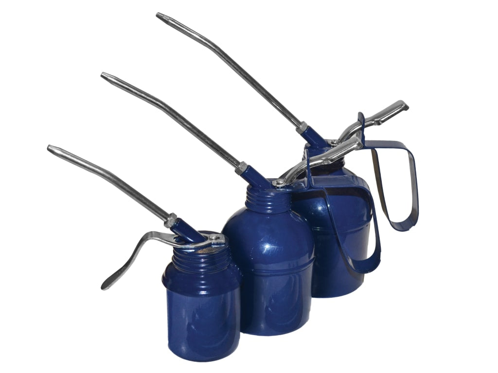 Four blue oil cans with metal nozzles on a white background