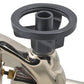 Close-up of a metallic valve handle with a black wheel on a white background