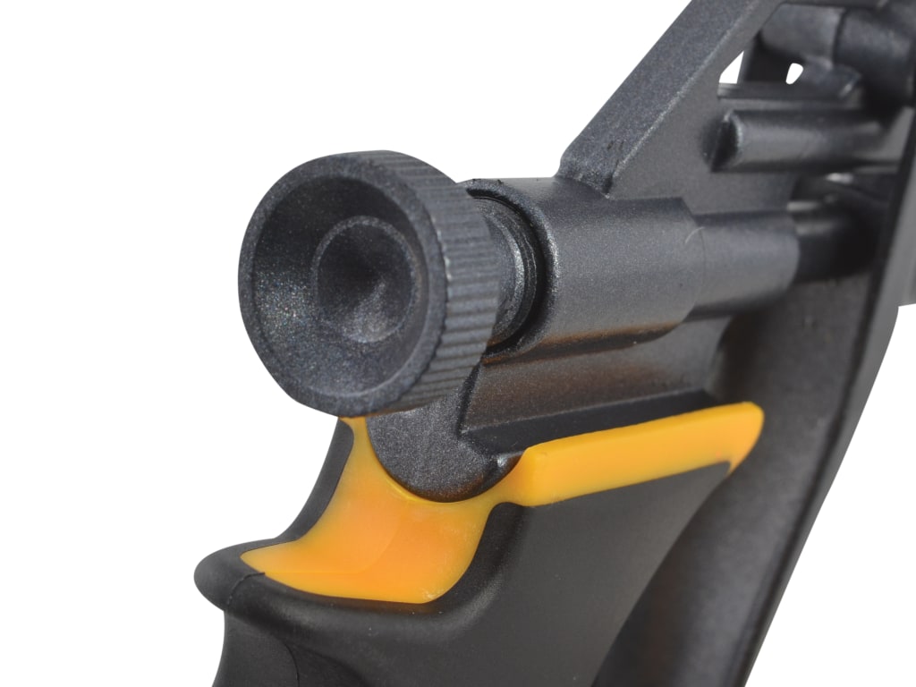 Close-up of a black and yellow tool on a white background
