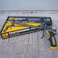 Foam gun with packaging on a textured surface