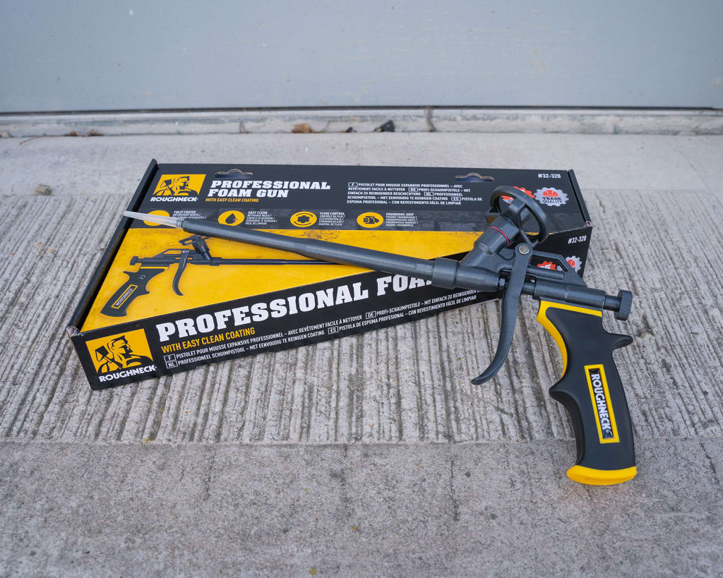 Foam gun with packaging on a textured surface