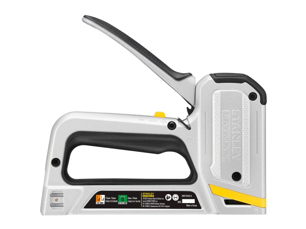 A Stanley cordless staple gun in white and black with yellow accents, shown from a side angle on a plain white background.