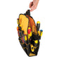 A black and yellow tool organizer pouch filled with various hand tools, held open by a person's hand against a white background.