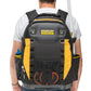 A person viewed from behind wearing a black and yellow Stanley FatMax backpack, with a white t-shirt and jeans, against a plain white background.