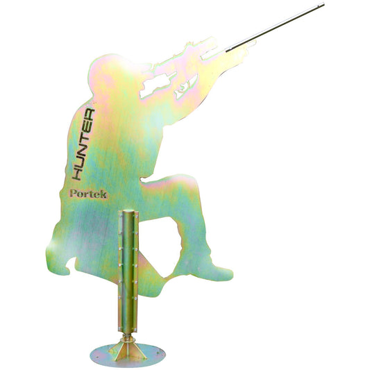 A metal yard sign shaped like a crouching hunter aiming a rifle, with a vertical post and round base. The sign has an iridescent finish shifting between pale green, gold, and pink, with the words 'HUNTER' and 'Portek' printed on it.