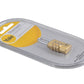 Gold combination lock in clear packaging with a yellow label on a white background