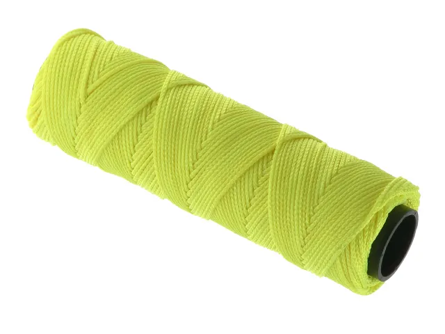 Rolled-up yellow thread on a white background