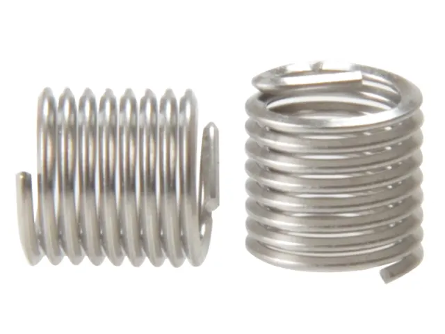 Two metal springs on a white background