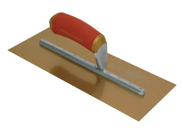 Plastering tool with red handle on a brown sheet of plaster