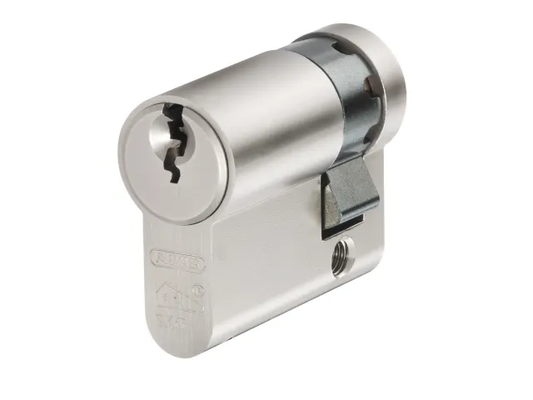 Metallic lock cylinder on a white background