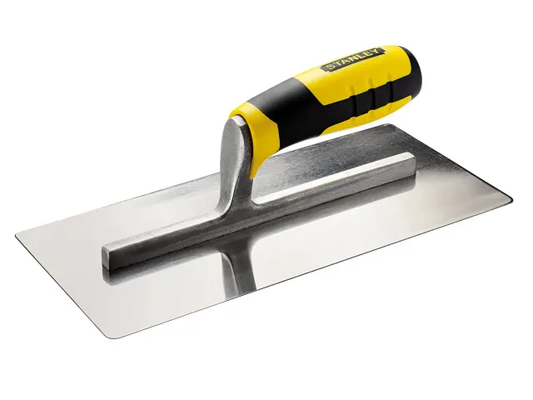 Stanley brick trowel with yellow and black handle on a white background