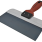 Metal trowel with red and black handle on a white background
