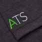 Embroidered 'ATS' logo on a dark fabric background