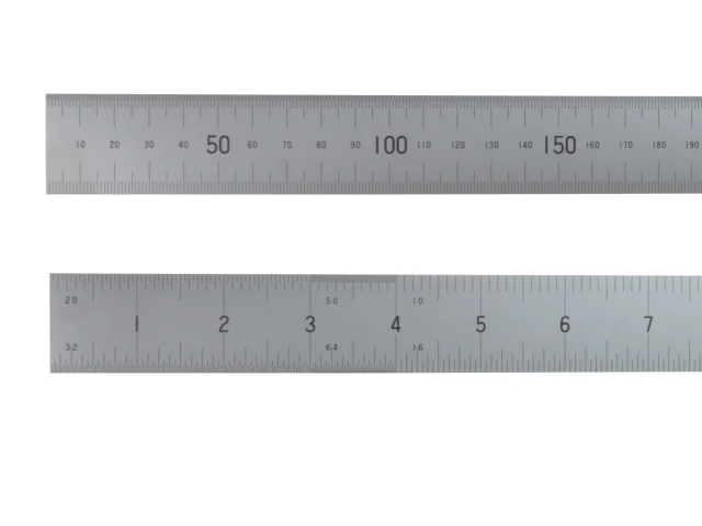Two metal rulers on a white background