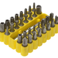 Set of screwdriver bits in a yellow holder on a white background
