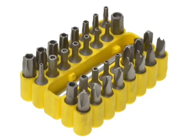 Set of screwdriver bits in a yellow holder on a white background