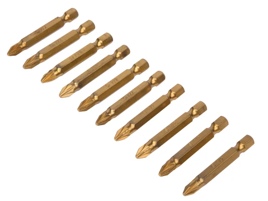 Set of gold drill bits on a white background