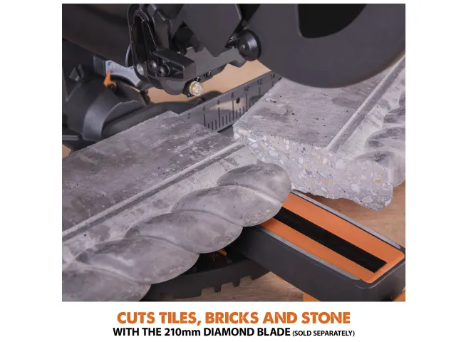 Tile cutting machine with diamond blade cutting through a tile, on a white background.