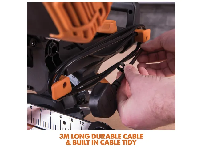 Hand connecting a cable to a power tool with a ruler showing 3 meters.