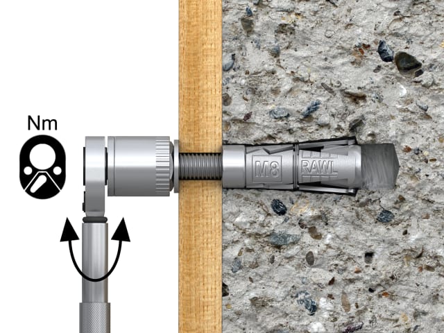 Drill bit attached to a drill on a concrete surface with measurement symbols.