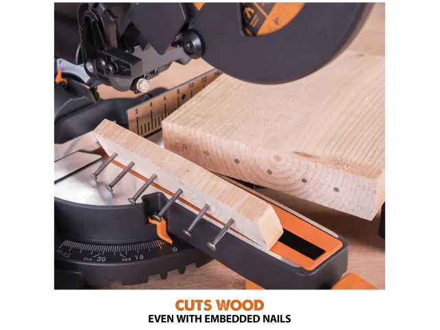 Circular saw cutting wood with embedded nails on a white background