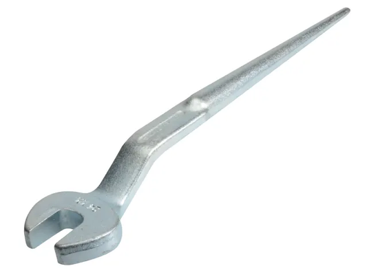 Metal wrench on a white background