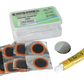 Puncture repair kit with patches, glue, and tools on a white background