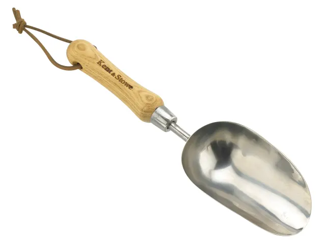 Metal garden scoop with wooden handle on a white background
