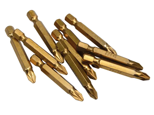Set of gold-colored drill bits on a white background