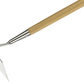 Gardening tool with wooden handle and metal head on a white background