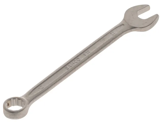 Metal wrench on a white background