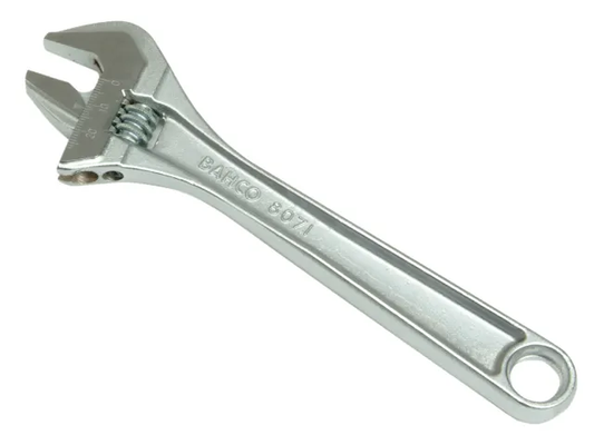 Metal adjustable wrench on a white background