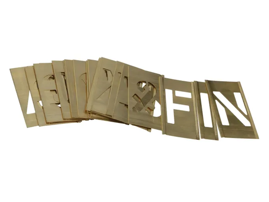 Gold metal letters spelling 'LEAF & FIN' on a white background