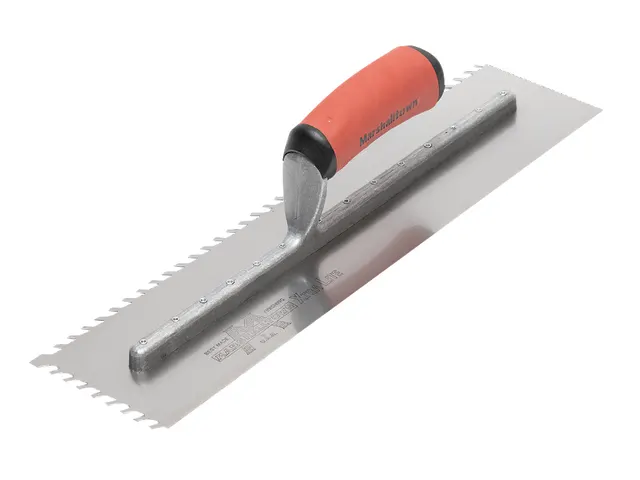 Metal trowel with red handle on a white background