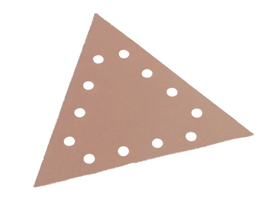 Triangular sandpaper sheet with holes on a white background