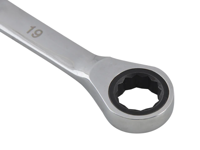 Close-up of a silver ratchet wrench on a white background