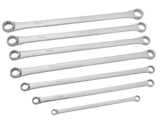 Set of six metallic wrenches on a white background